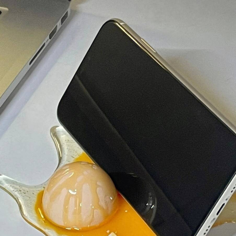 Broken egg phone stand